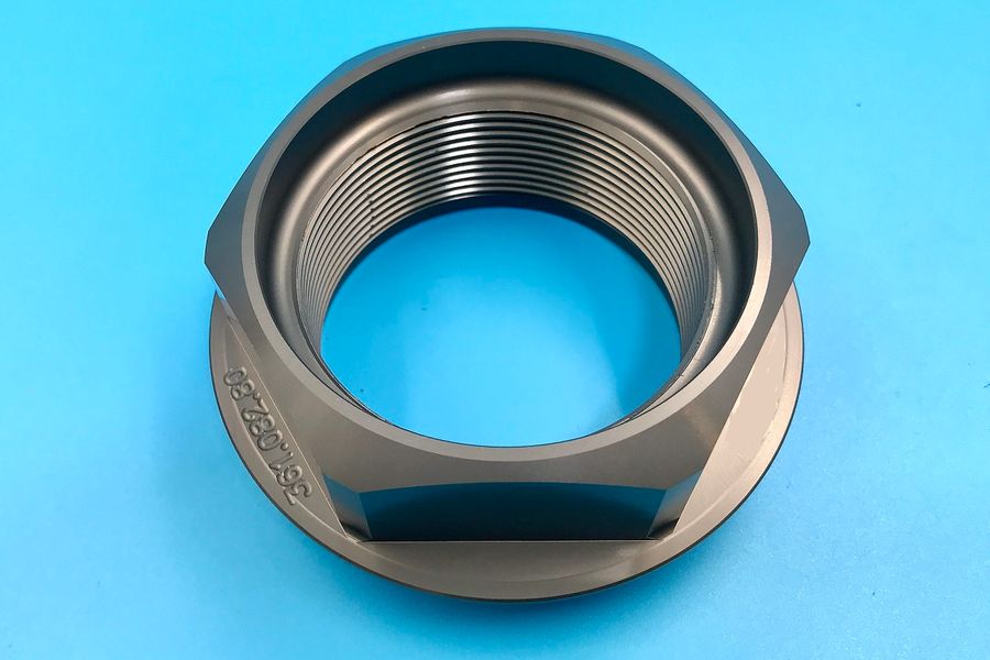 CENTRE LOCK NUT 1973/74 RSR LEFT HAND THREAD